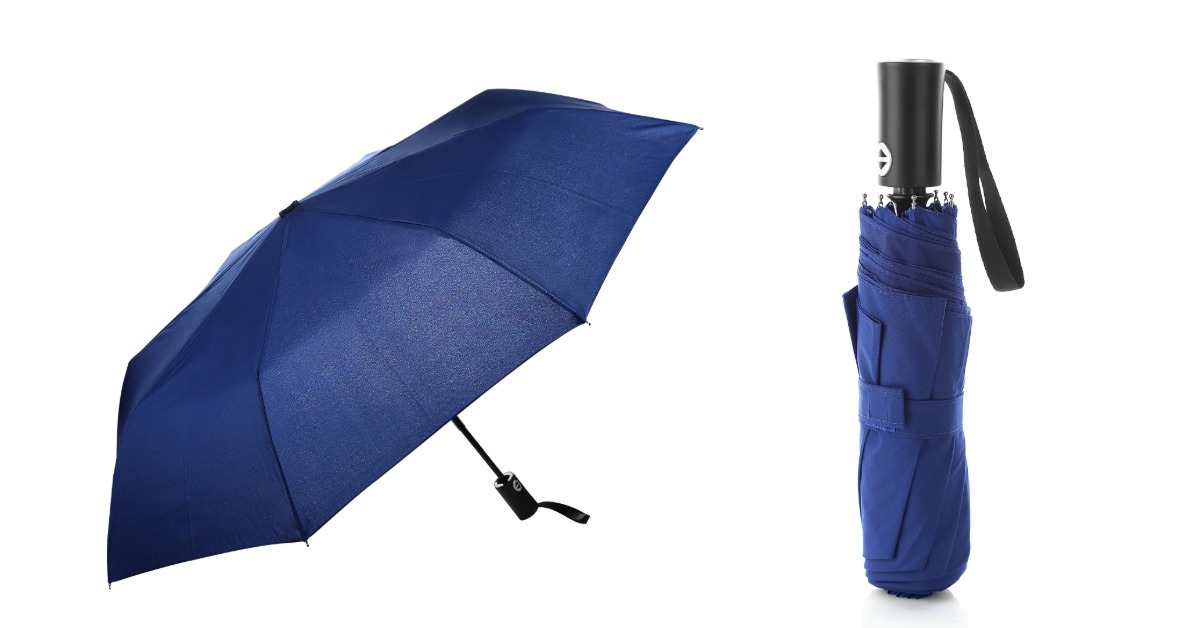 Two navy blue umbrellas sit along a white background. One is open and the other is in its protective pouch.