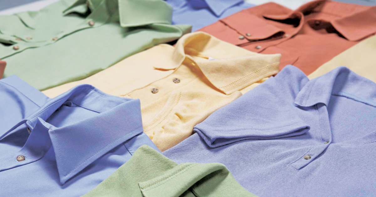 A set of polo shirts in various styles and varieties, including green, blue, yellow, and orange colored shirts.